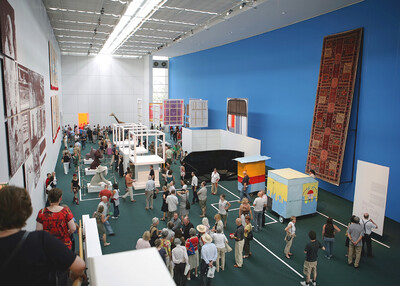 documenta Halle with many visitors and different installations.